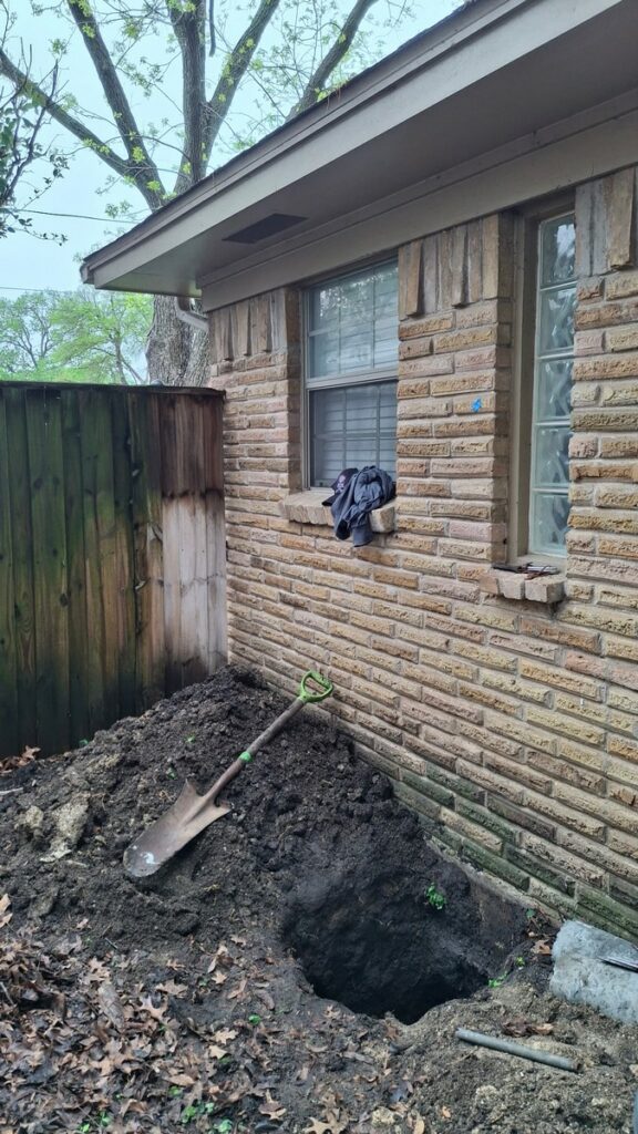 Foundation Repair Contractors Install Piers and Drain Upgrade in Richardson, TX