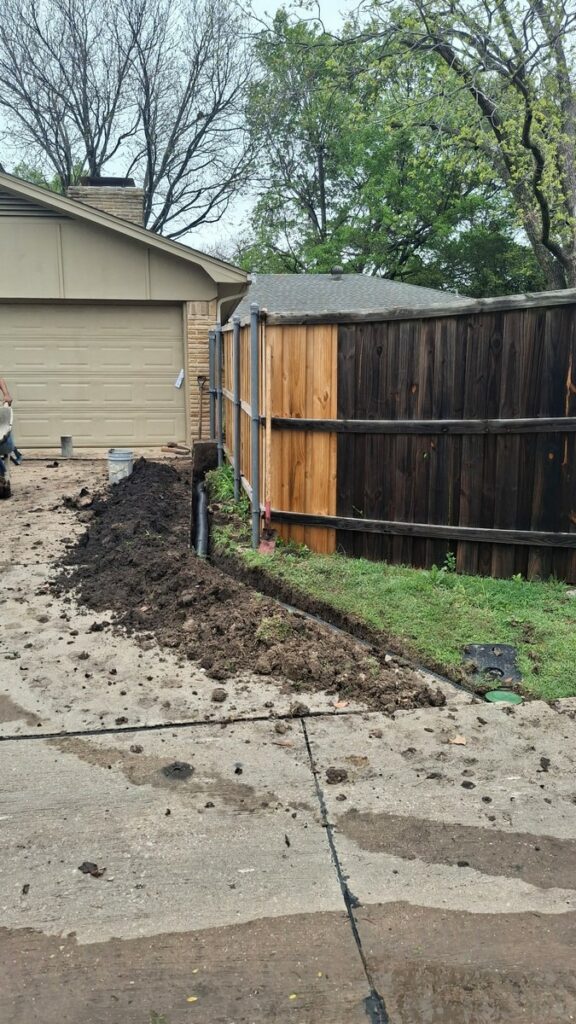Foundation Repair Contractors Install Piers and Drain Upgrade in Richardson, TX